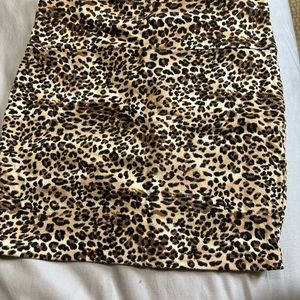 TWO LEOPARD PRINTED SKIRTS